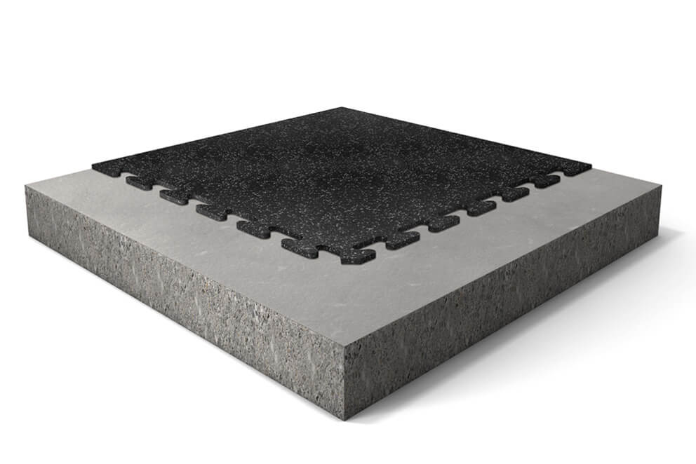 Single REGUPOL aktivlok interlocking rubber tile loose-laid on a concrete subfloor