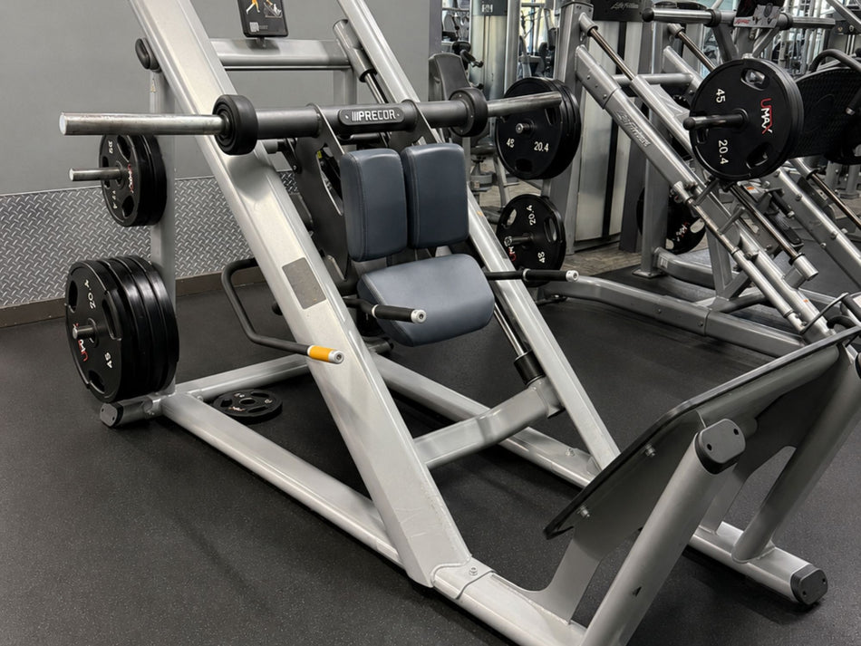 Precor plate-loaded leg press included in a premium pre-owned commercial gym equipment package.
