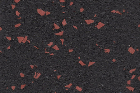 Firestorm Red REGUPOL rubber gym flooring material photo showing red flecks on a black base