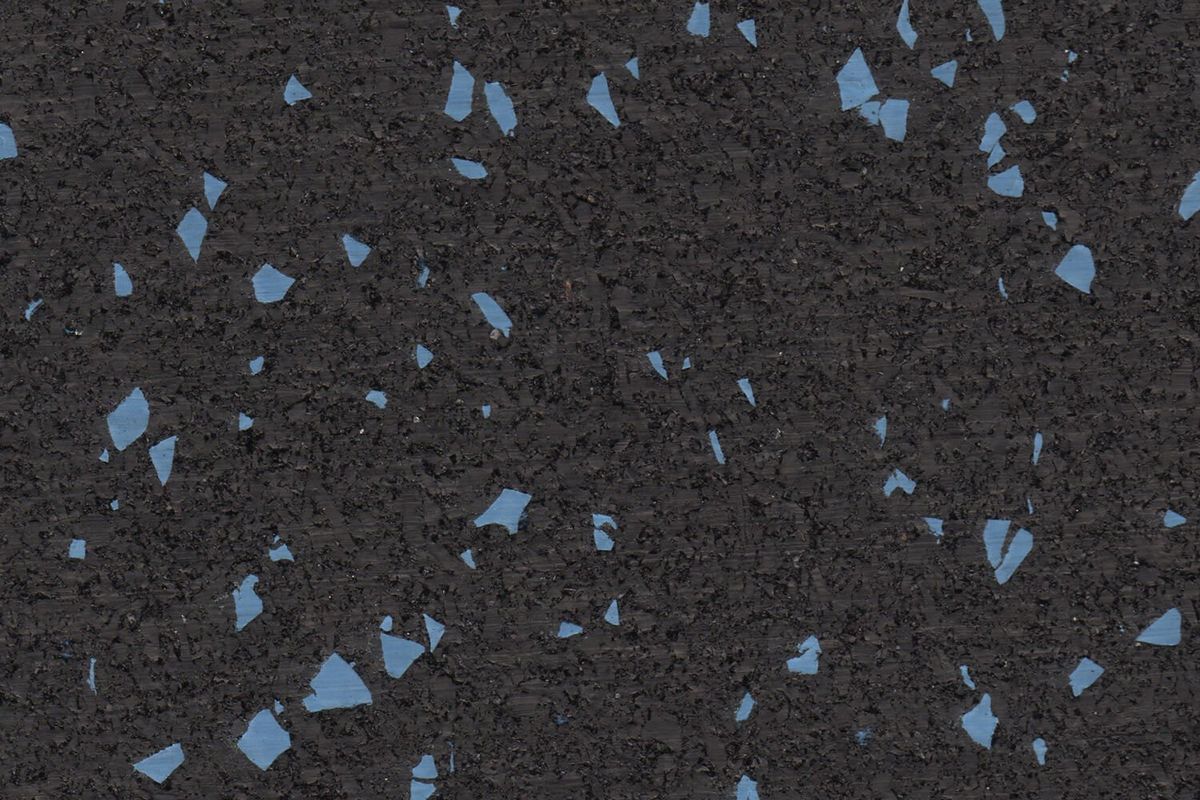 Jayz Blue REGUPOL rubber gym flooring material photo showing blue flecks on a black base