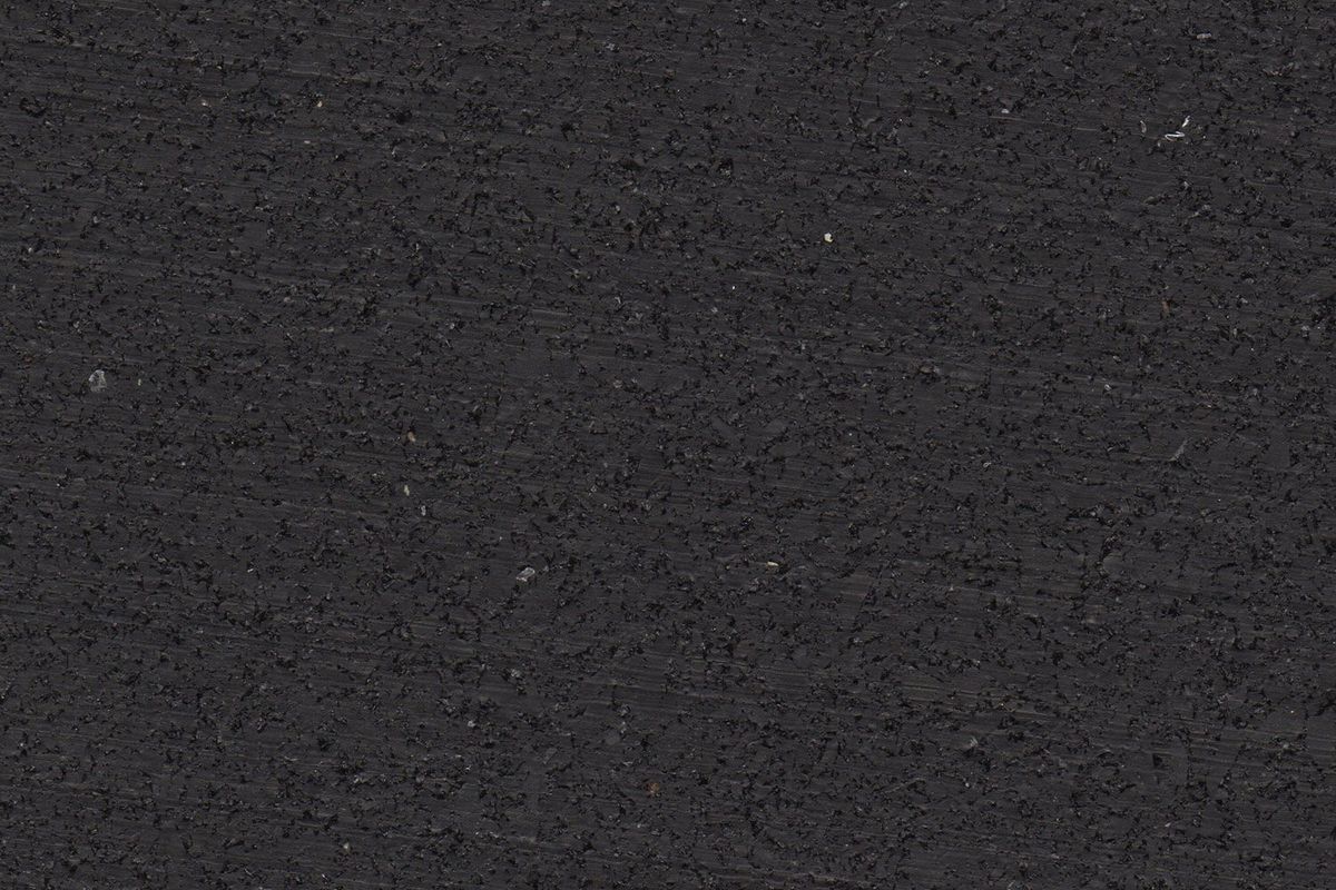 Jet Black REGUPOL rubber gym flooring material photo showing a solid black surface