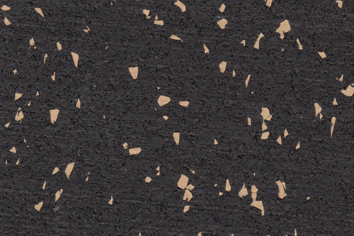 Titan Tan REGUPOL rubber gym flooring material photo showing tan flecks on a black base